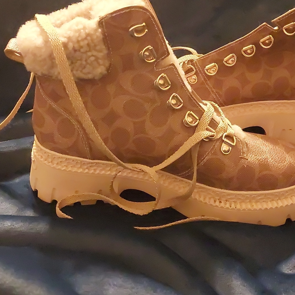 Coach print shearling boots